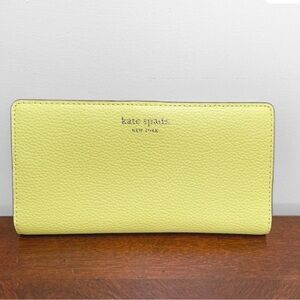 Kate Spade Eva pebble leather slimline wallet in the color Limelight EUC!